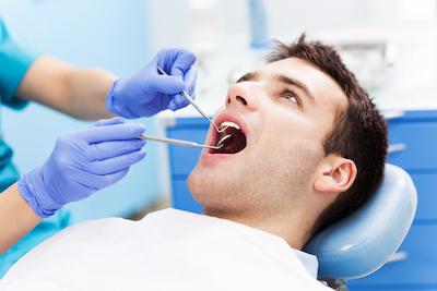 man receiving dentist exam | general dentist cookeville tn